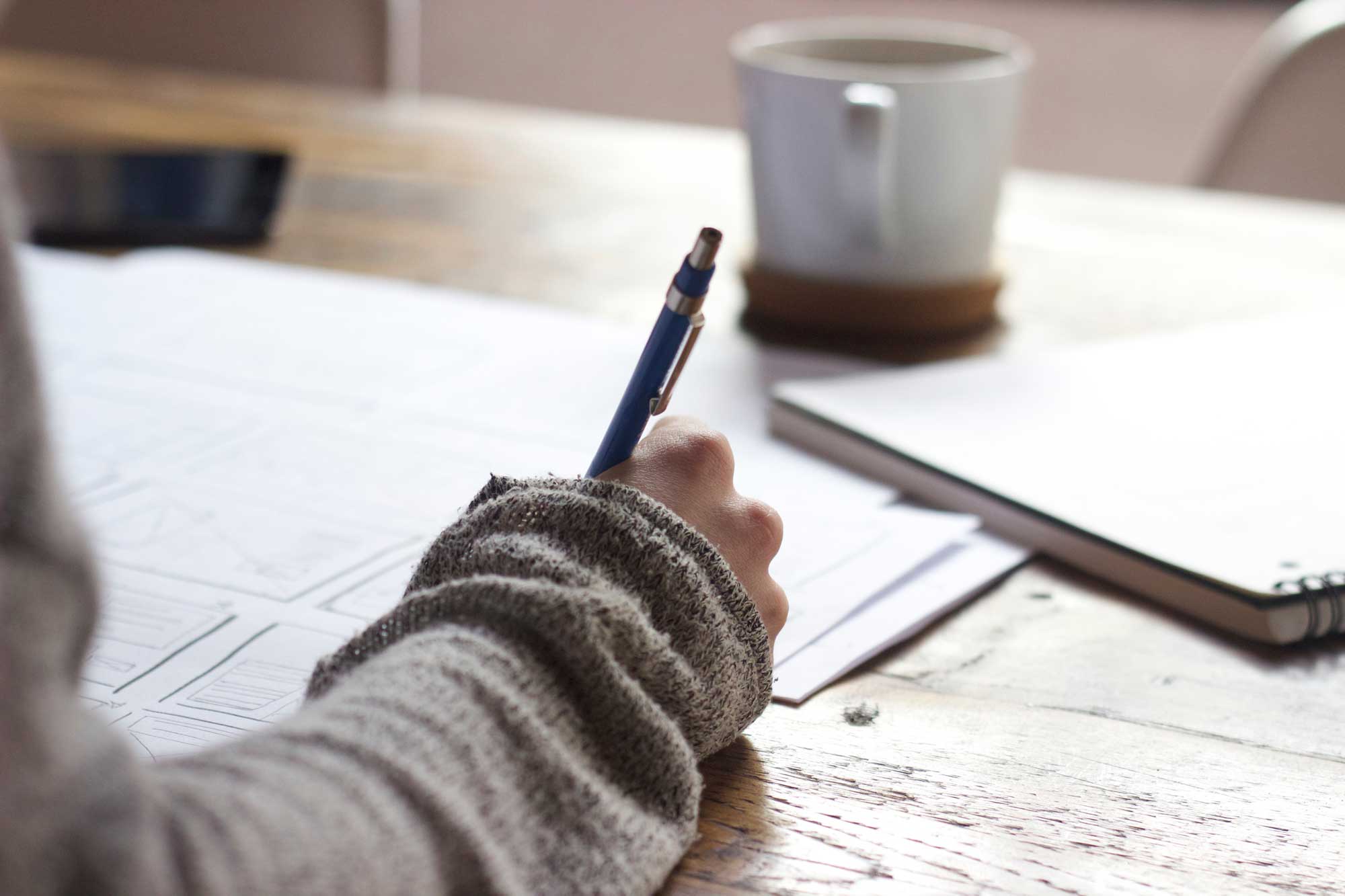 close-up-of-person-writing