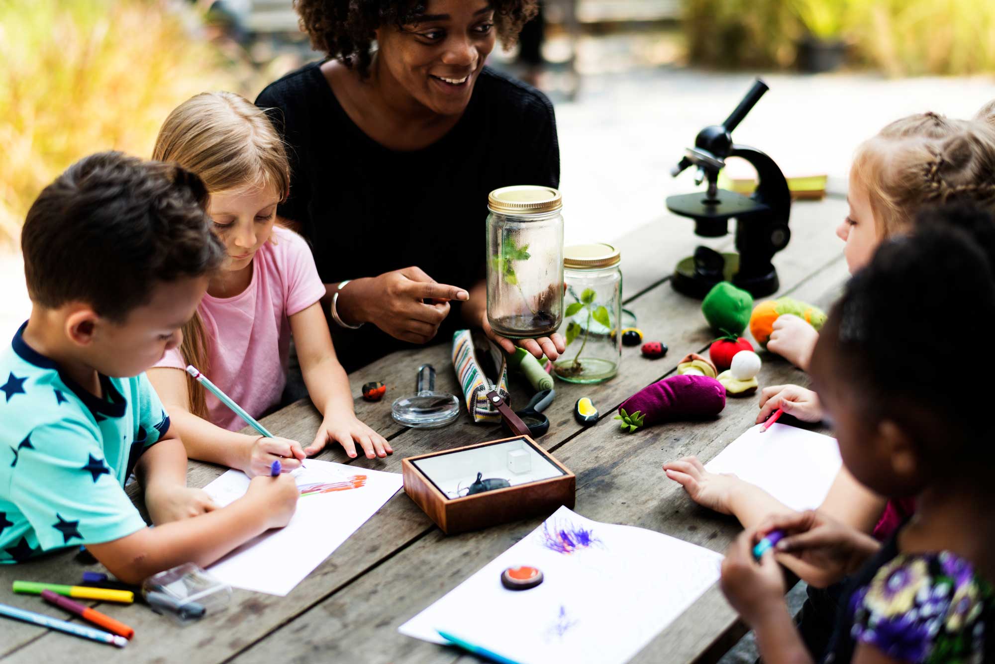 group-of-kids-classmates-learning-biology-drawing-class